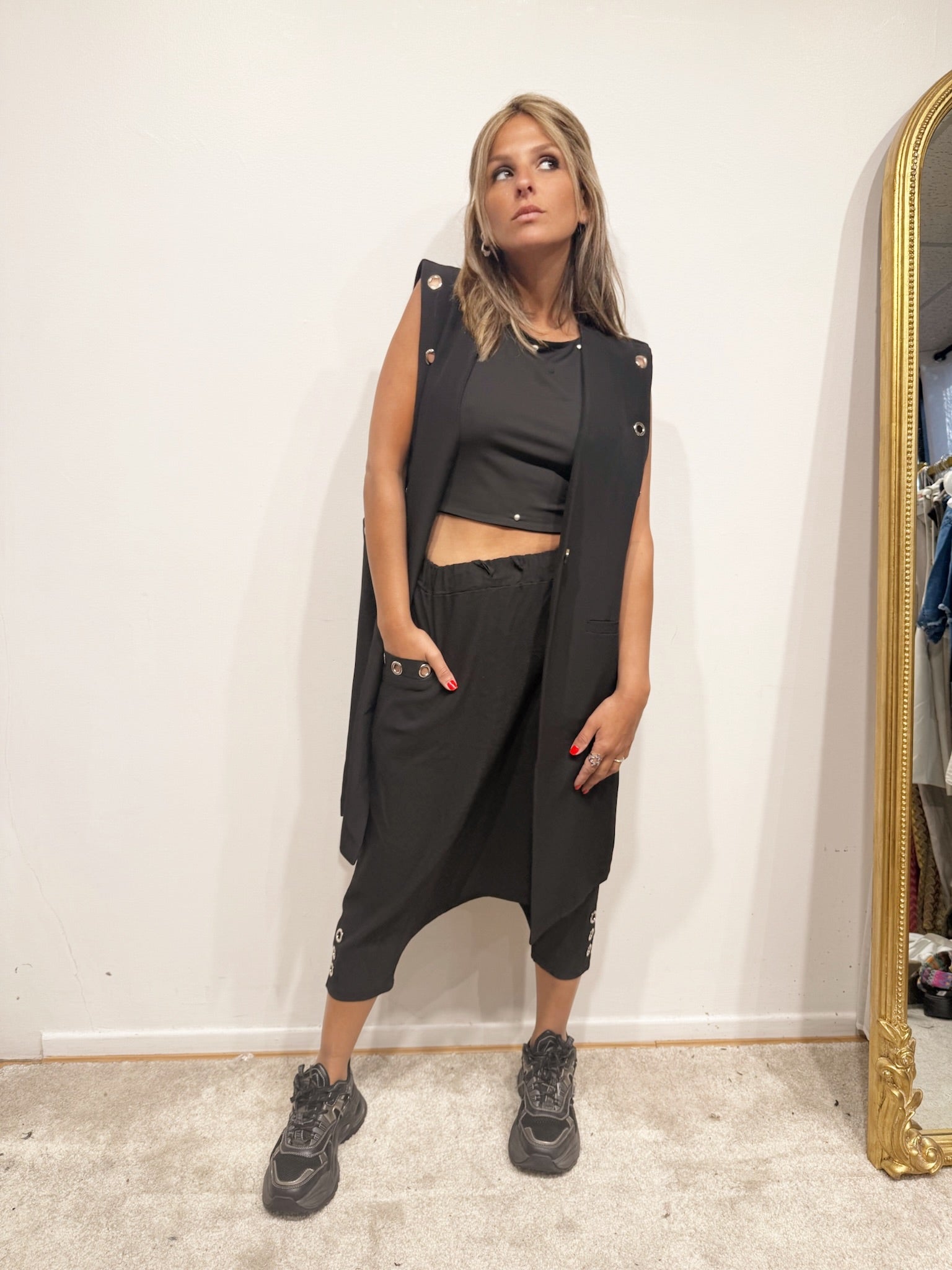 Veste sans manche à oeillet