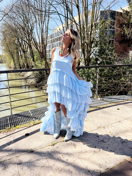 Robe courte devant longue derrière
